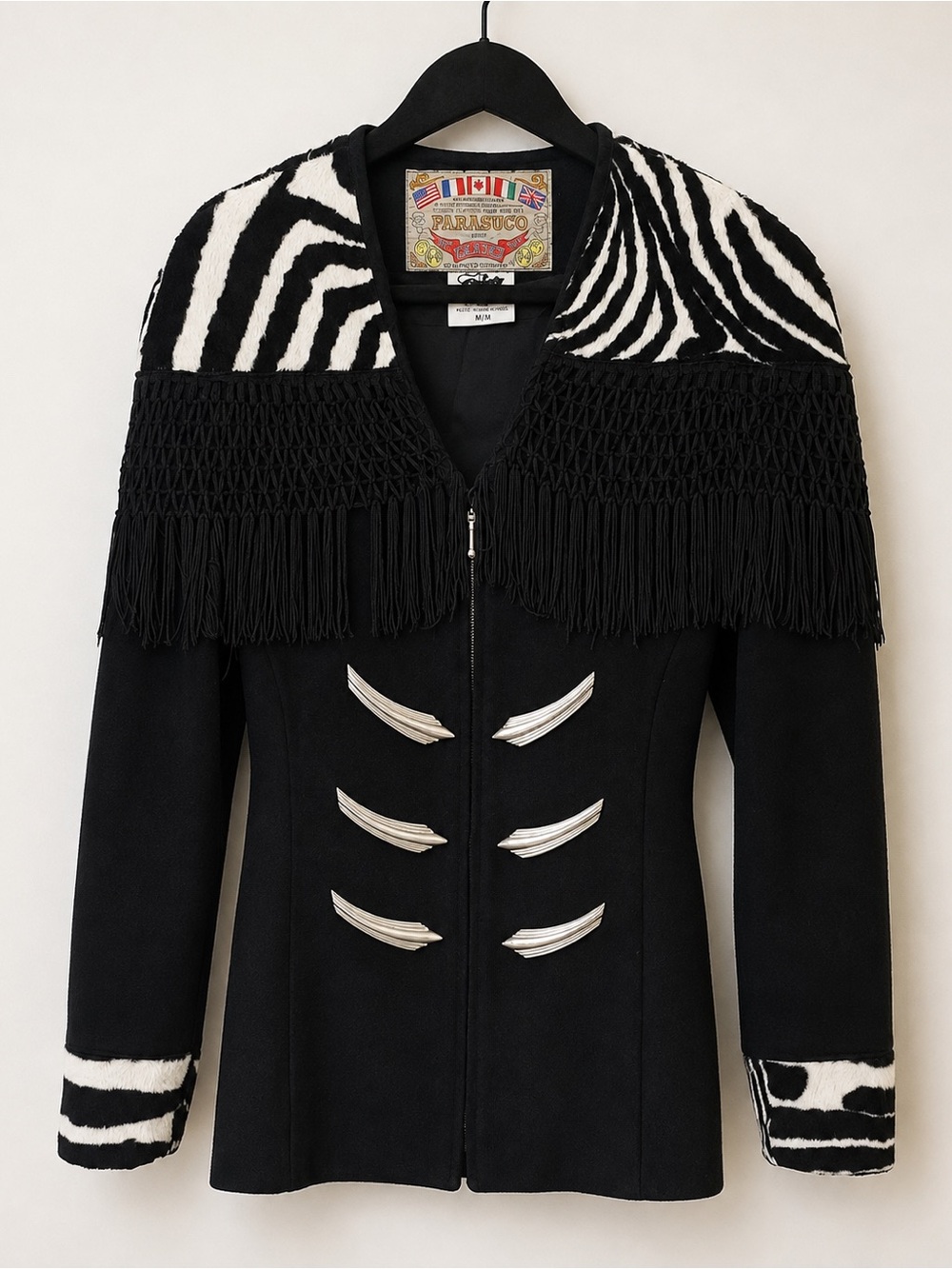 Crafted from 100% pure wool, this statement jacket is warm, luxurious, and beaut